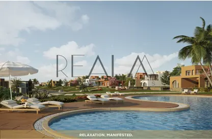 Chalet - 2 Bedrooms - 2 Bathrooms for sale in Makadi Orascom Resort - Makadi - Hurghada - Red Sea