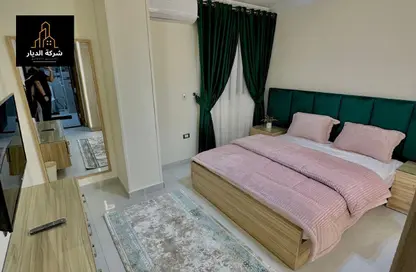 شقة - 2 غرف نوم - 2 حمامات للايجار في شارع محي الدين أبو العز - الدقي - الجيزة
