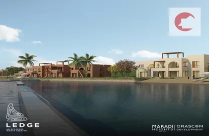 Chalet - 2 Bedrooms - 2 Bathrooms for sale in Makadi Orascom Resort - Makadi - Hurghada - Red Sea