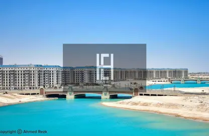 Chalet - 2 Bedrooms - 2 Bathrooms for sale in Latin District - New Alamein City - Al Alamein - North Coast