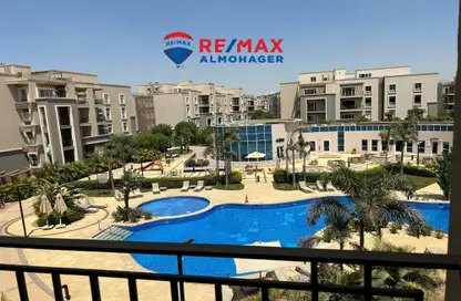 Apartment - 3 Bedrooms - 3 Bathrooms for sale in October Plaza - 6 October Compounds - 6 October City - Giza