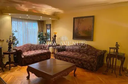 Apartment - 3 Bedrooms - 3 Bathrooms for sale in Ahmed Heshmat St. - Zamalek - Cairo