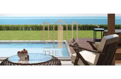 Twin House - 4 Bedrooms - 4 Bathrooms for sale in Beit Al Bahr - Sidi Heneish - North Coast