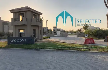 Villa - 4 Bedrooms - 5 Bathrooms for sale in Palm Hills WoodVille - Al Wahat Road - 6 October City - Giza