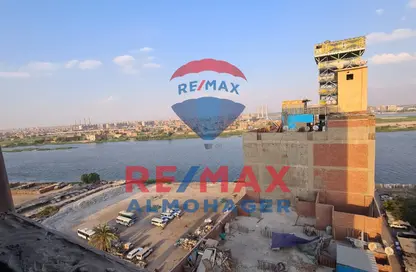 Apartment - 4 Bedrooms - 4 Bathrooms for sale in Warraq Al Arab - Al Warraq - Giza