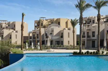 Chalet - 2 Bedrooms - 2 Bathrooms for sale in Makadi Orascom Resort - Makadi - Hurghada - Red Sea