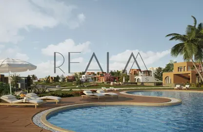 Chalet - 2 Bedrooms - 2 Bathrooms for sale in Makadi Orascom Resort - Makadi - Hurghada - Red Sea