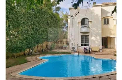 Villa - 4 Bedrooms - 5 Bathrooms for sale in Rawda - Al Wahat Road - 6 October City - Giza