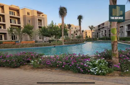 Apartment - 2 Bedrooms - 3 Bathrooms for sale in October Plaza - 6 October Compounds - 6 October City - Giza