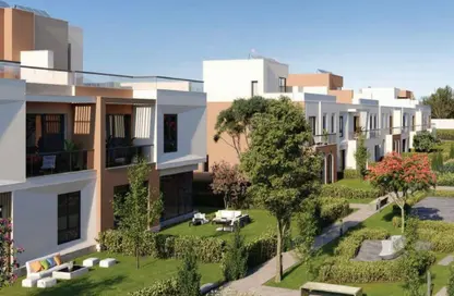 Twin House - 5 Bedrooms - 5 Bathrooms for sale in Vye Sodic - New Zayed City - Sheikh Zayed City - Giza