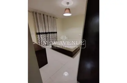 Apartment - 2 Bedrooms - 2 Bathrooms for sale in Easy Life - South Investors Area - New Cairo City - Cairo