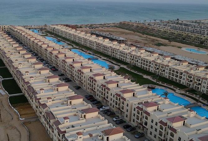 Chalet - 2 Bedrooms - 2 Bathrooms for sale in Lasirena Palm Beach - Al Ain Al Sokhna - Suez