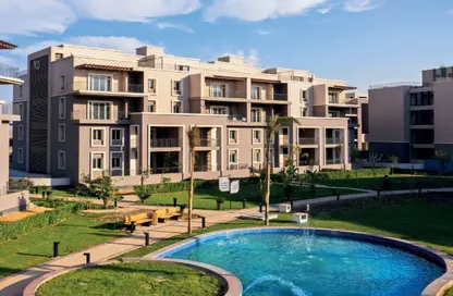 Apartment - 2 Bedrooms - 2 Bathrooms for sale in October Plaza - 6 October Compounds - 6 October City - Giza