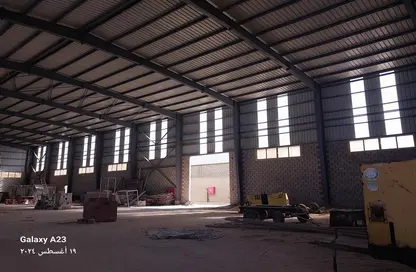 Warehouse - Studio - 3 Bathrooms for rent in Badr Industrial Zone - Badr City - Cairo