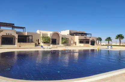 Chalet - 2 Bedrooms - 2 Bathrooms for sale in Makadi Orascom Resort - Makadi - Hurghada - Red Sea