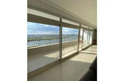 Apartment - 3 Bedrooms - 3 Bathrooms for sale in Nile St. - Dokki - Giza