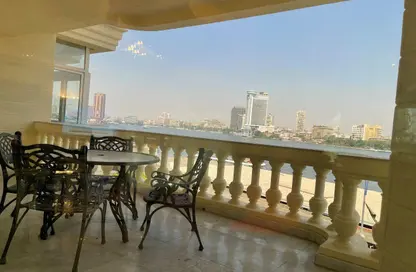 Apartment - 4 Bedrooms - 4 Bathrooms for sale in Nile St. - Dokki - Giza