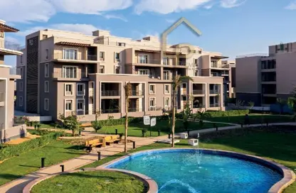 Apartment - 2 Bedrooms - 3 Bathrooms for sale in October Plaza - 6 October Compounds - 6 October City - Giza