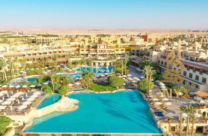 Chalet - 3 Bedrooms - 3 Bathrooms for sale in Makadi Orascom Resort - Makadi - Hurghada - Red Sea