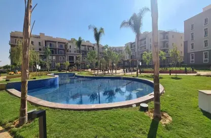 Apartment - 2 Bedrooms - 2 Bathrooms for sale in October Plaza - 6 October Compounds - 6 October City - Giza