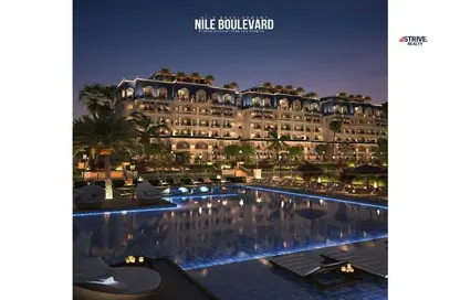 Apartment - 2 Bedrooms - 2 Bathrooms for sale in Nile Boulevard - New Cairo City - Cairo