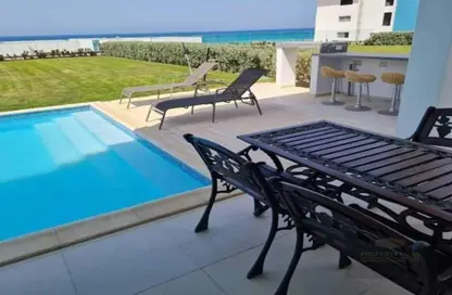 Chalet - 2 Bedrooms - 2 Bathrooms for sale in Bungalows - Markaz Al Hamam - North Coast