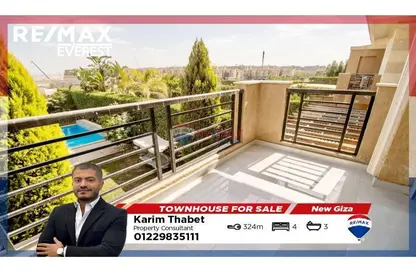 Twin House - 4 Bedrooms - 3 Bathrooms for sale in New Giza - Cairo Alexandria Desert Road - 6 October City - Giza